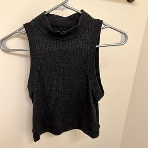 Dark grey cropped sweater turtle neck.